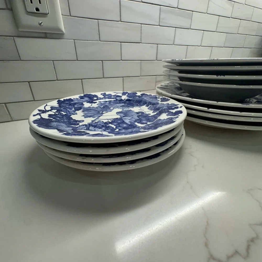 Four Crate and Barrel and Windsor Blue and White Grapevine place settings